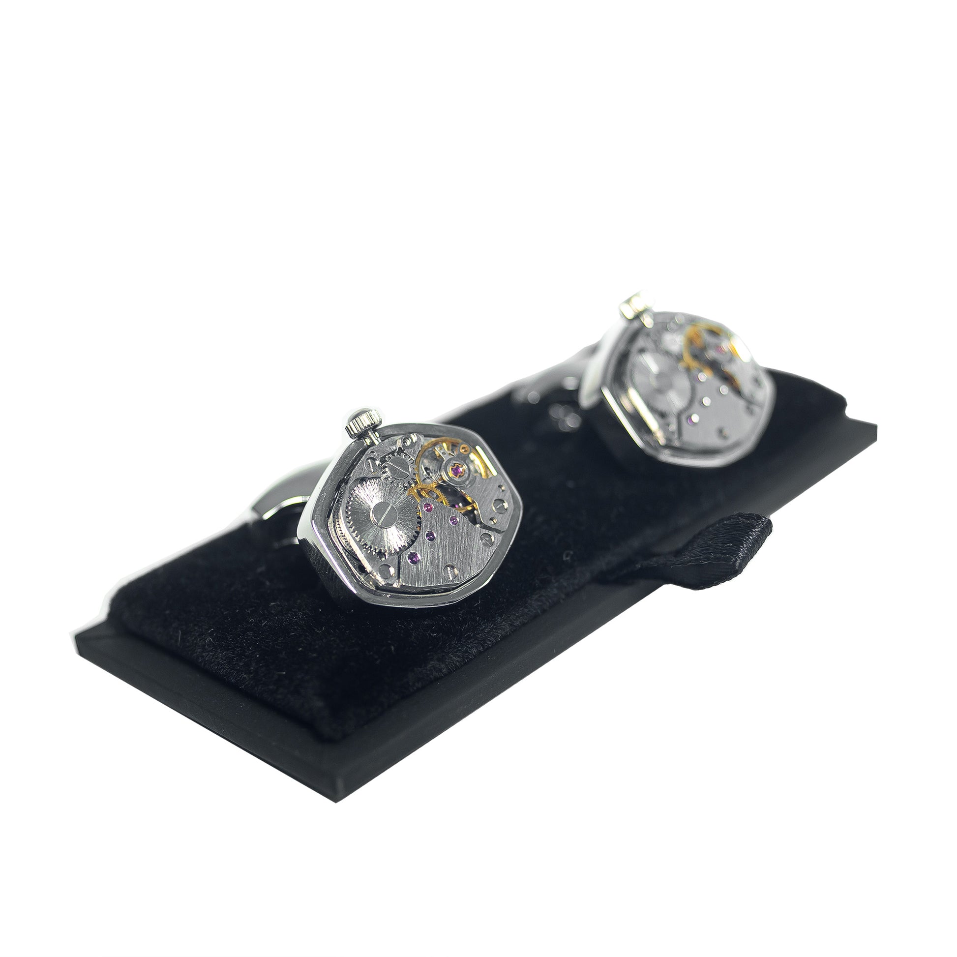 A side shot of a pair of Foxtrot Chronolinks crown cufflink