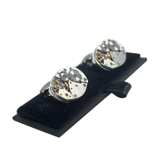 A pair of Foxtrot Chronolinks oval cufflink